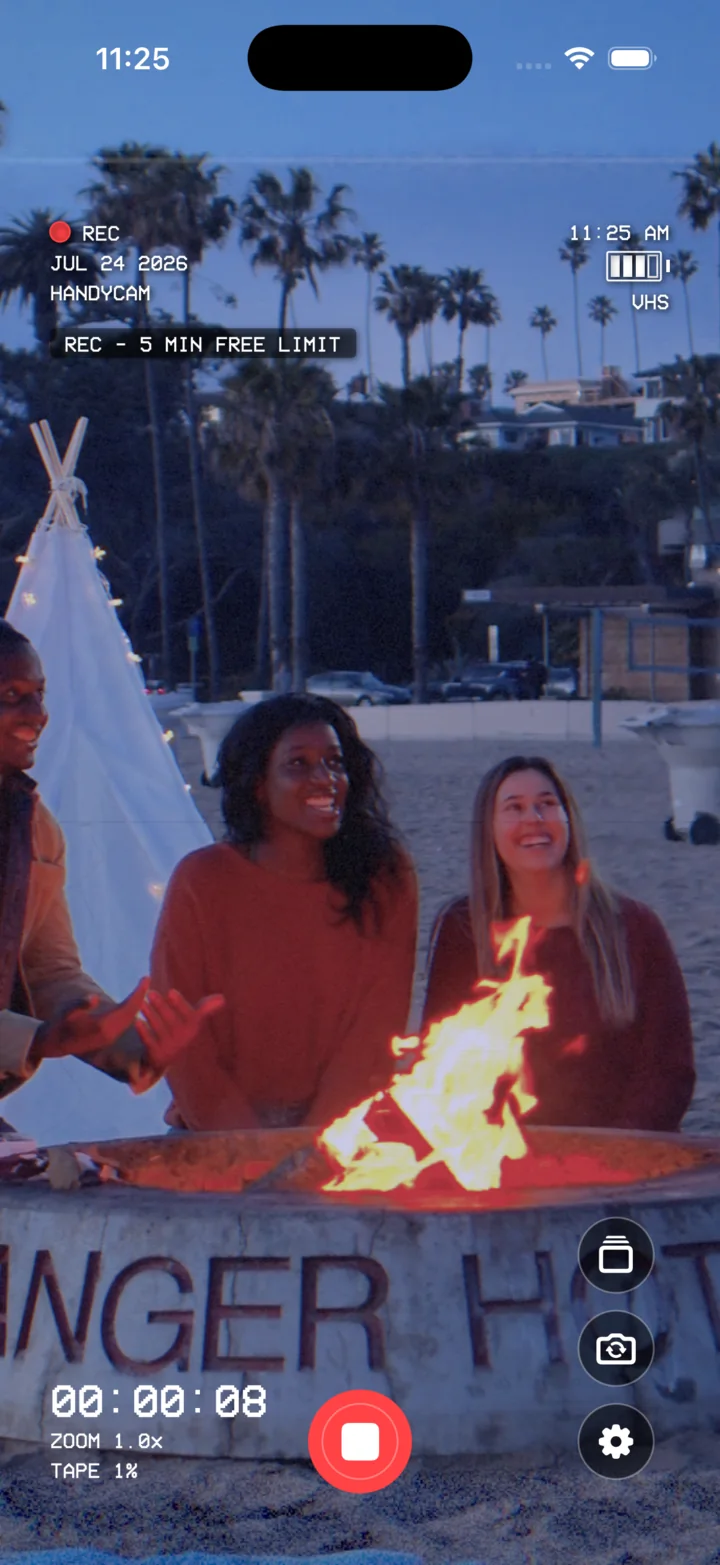 HomeMovieCam actively recording friends around a beach bonfire.