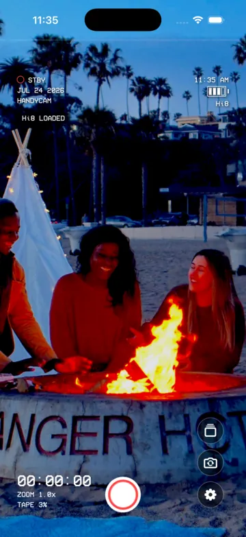 The same beach bonfire rendered with the Hi8 camcorder look.