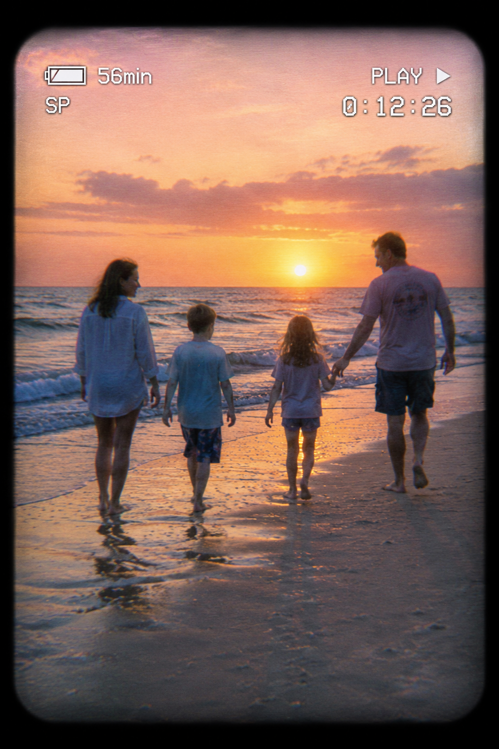 A full-screen camcorder viewfinder at sunset.
